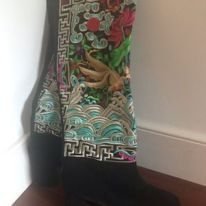 Beautiful black with embroidered pattern boots.